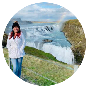 Dr. Meghan T. Lee of Horizon Neuropsychological Services, Littleton, Colorado standing in front of a waterfall